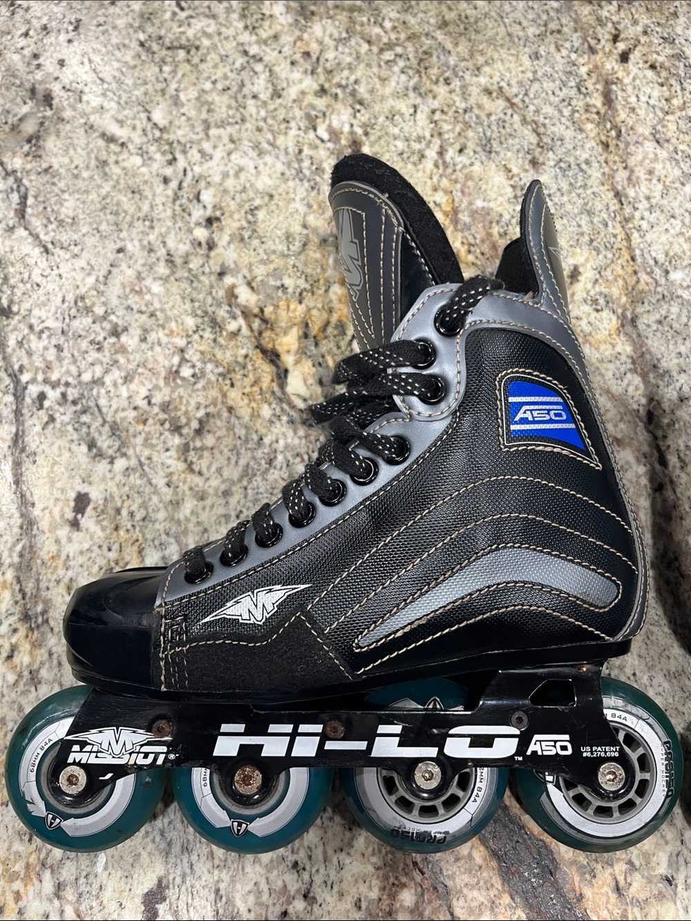 Mission A50 Inline Hockey Skate - Size 4D Black with Teal Wheels